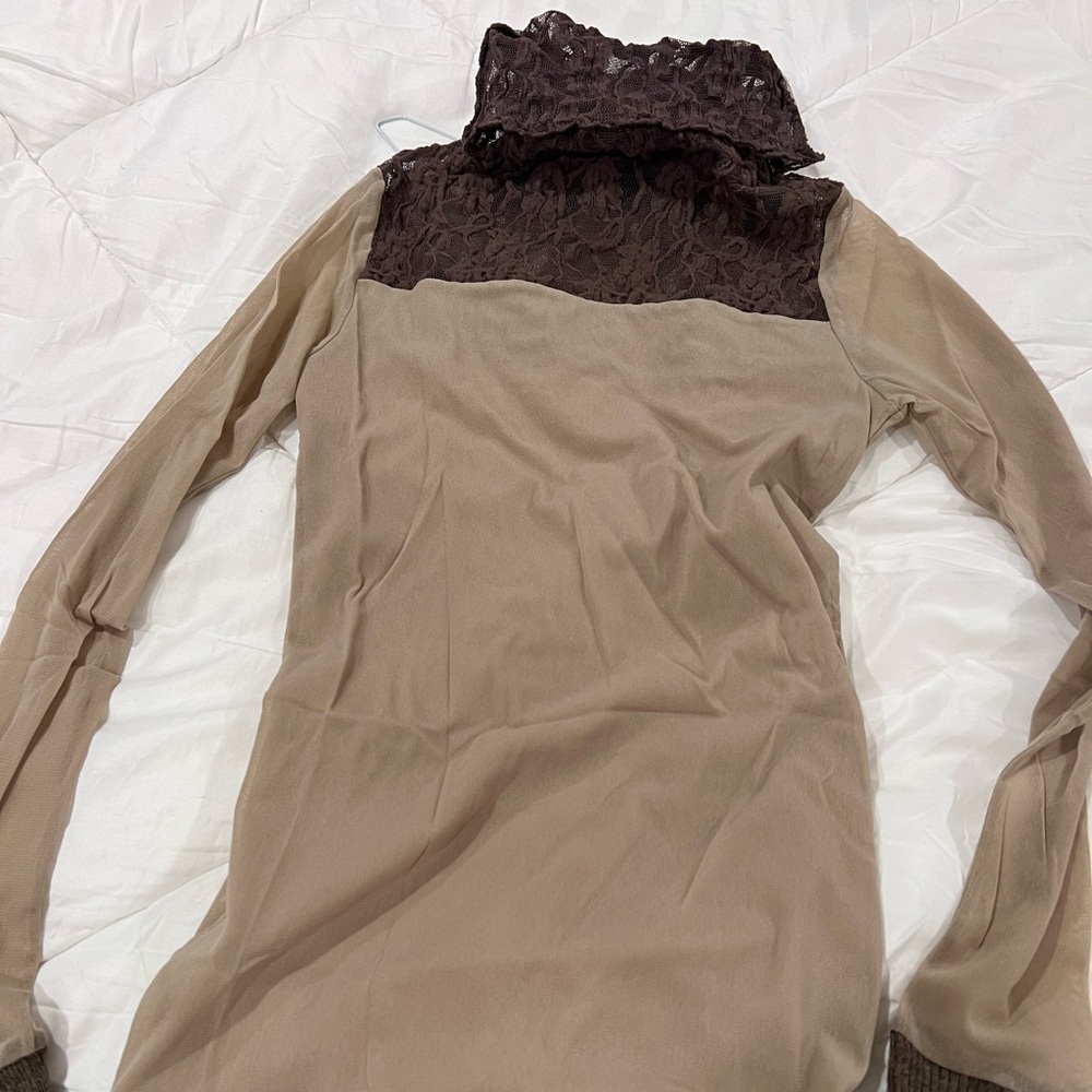 Italian made lacy turtle neck top.